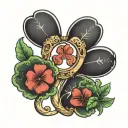 horseshoe with four leaf clover tattoo design idea