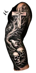 Full arm sleeve tattoo with a large cross on upper arm with tree around it, Skulls, a flying crow, and tribal accents tattoo design idea