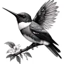 colibri gracefully perched tattoo design idea