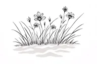 flowers and grass on the sand tattoo design idea