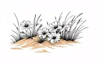 flowers and grass on the sand tattoo design idea