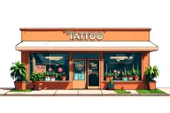 outside of 2 story tattoo shop with big windows and plants inside them tattoo design idea