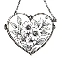heart shaped locket with flowers in it tattoo design idea