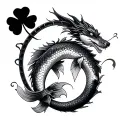 4 leaf clover koi fish and dragon horseshoe tattoo design idea