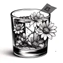 broken short whiskey glass with flowers emerging from cracks and small price tag hanging out from top tattoo design idea