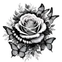fading rose within cursive writing and butterflies and lei wrapped around tattoo design idea