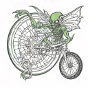 alien and bicycle wheel tattoo design idea