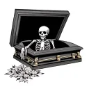 skeleton  in casket tattoo design idea