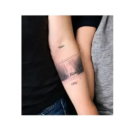 arm band with my kids names, Thiago(08/19/2010) and Lucia(03/31/2025) and their birth dates tattoo design idea