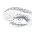 a woman's eyelashes tattoo design idea